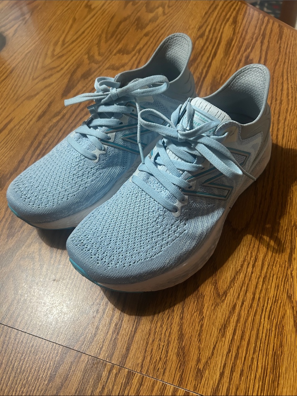 New Balance Pale Blue Knit Running Shoes